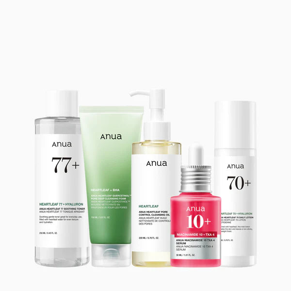 Set of Anua skincare products on a white background
