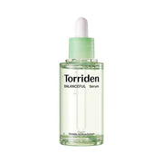 A bottle of Torriden Balanceful Cica Calming Serum with a dropper, primarily green in color.