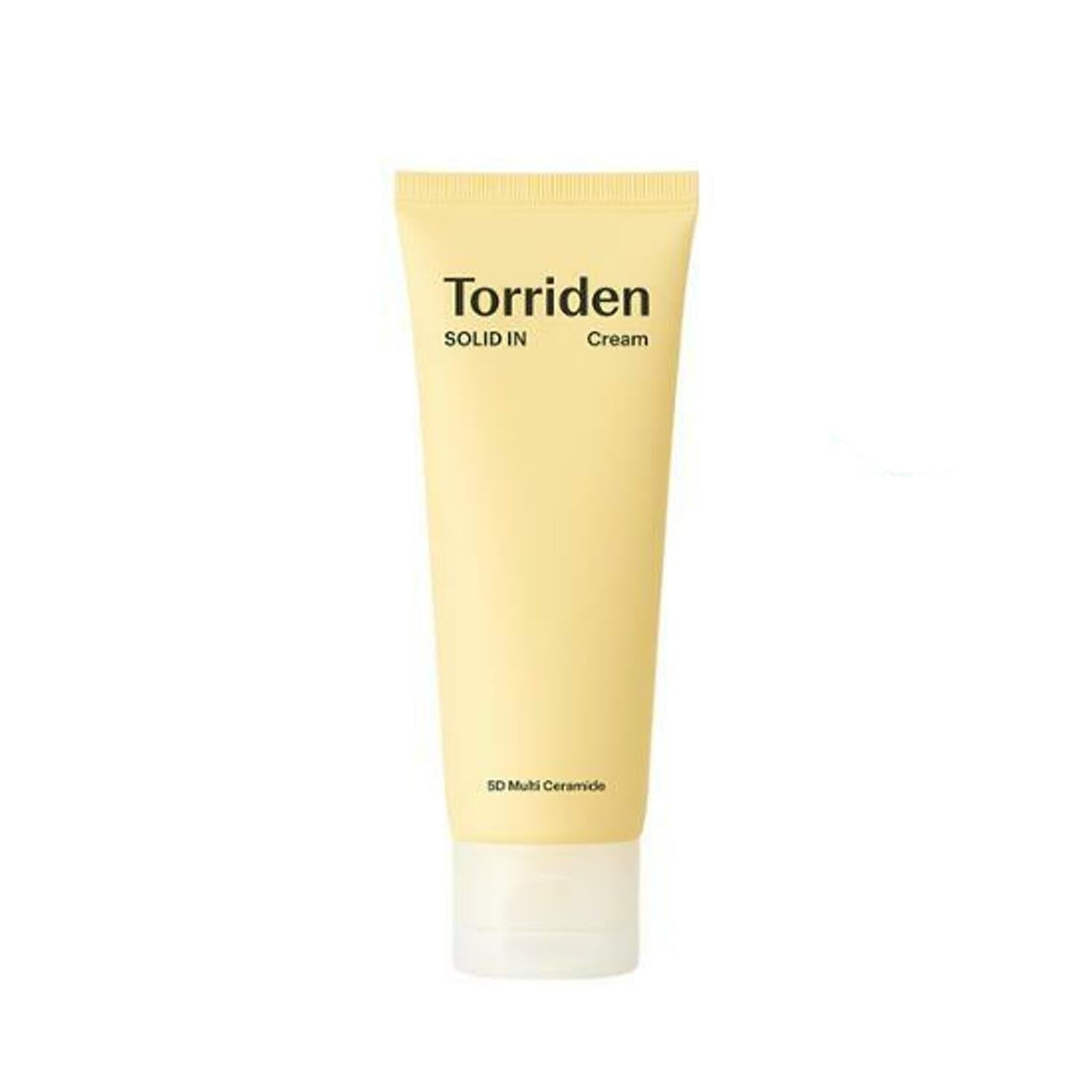 A tube of Torriden Solid In Ceramide Cream with a yellow hue and white cap.
