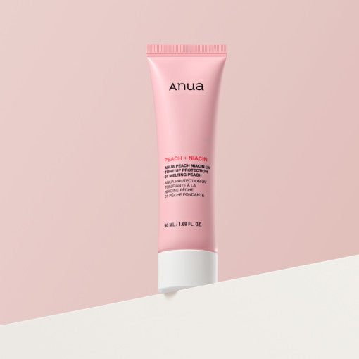 Anua Peach Niacin UV Tone Up Protection cream for Korean skincare, brightening and UV protection with peach tone finish.
