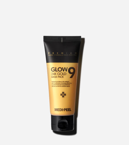 A tube of MEDIPEEL Glow 9 24K Gold Mask Pack with black and gold color scheme.