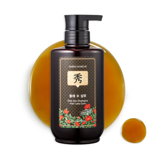 Dark bottle of Daeng Gi Meo Ri hair loss shampoo with herbal-themed design, gel texture for Korean scalp care