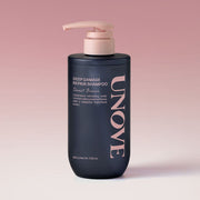 UNOVE Deep Damage Repair Shampoo 500ml in beige bottle with pump, minimal design, placed on neutral-toned surface