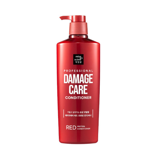 Red bottle of damage care conditioner on a white background
