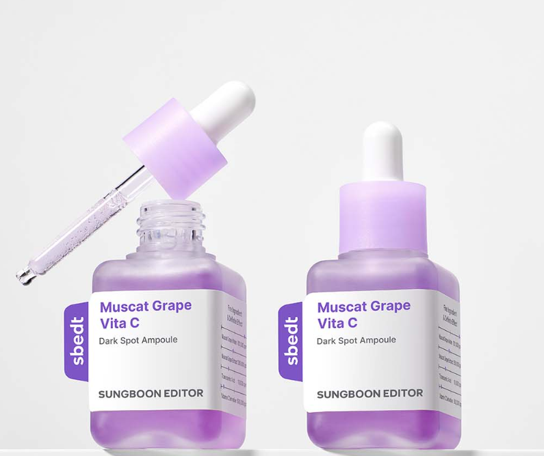 Purple skincare ampoule bottle with dropper on a white background